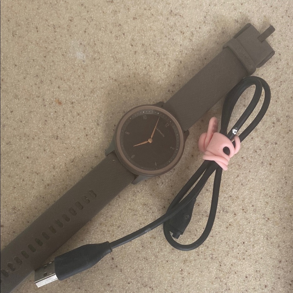 Brown Garmin Vivomive Sport with Charging Cable